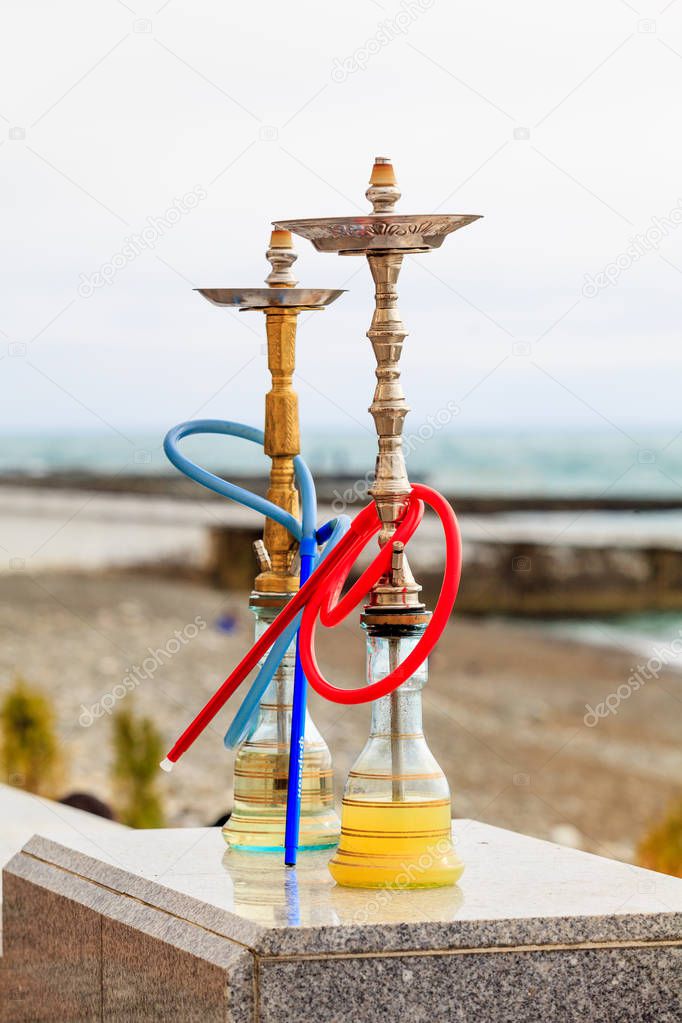 traditional arabic shisha pipes hookah or Water pipe. Sea View R