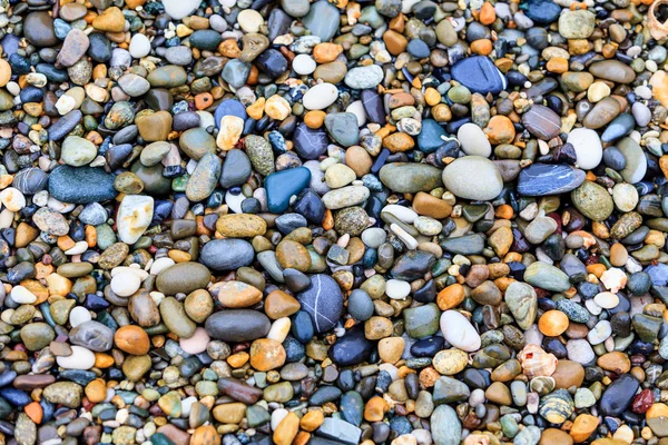 Kamienie na plaży. kamienne podłoże — Zdjęcie stockowe