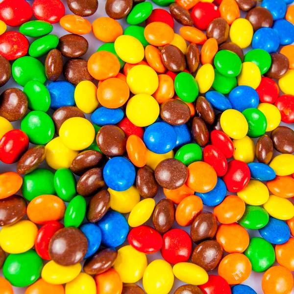 お菓子の背景。複数の色のお菓子 — ストック写真