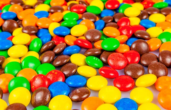 Dulces de colores. Dulces de chocolate de colores para fondos — Foto de Stock