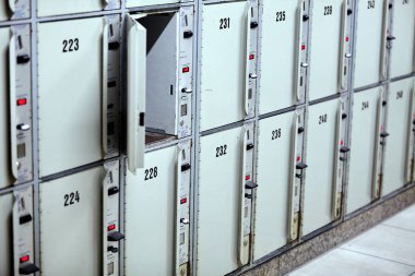 lockers storage compartments with numbers. Locker in train stati clipart