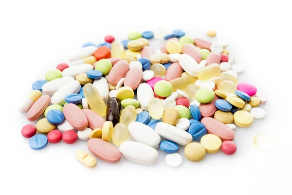 Pílulas coloridas. Comprimidos médicos ou vitamínicos. Comprimido medicamento colorido — Fotografia de Stock