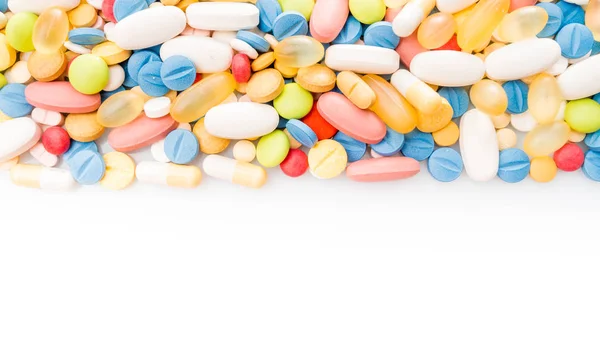 Pills border. Multicoloured medical pills — Stock Photo, Image