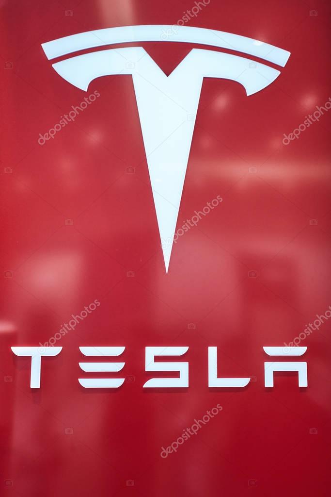 Dusseldorf, Germany - September 09, 2017: Tesla Logo sign  at  Tesla Motors store in Dusseldorf, Germany