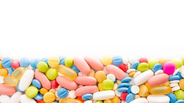 Pilules frontière. Pilules médicales multicolores Image En Vente