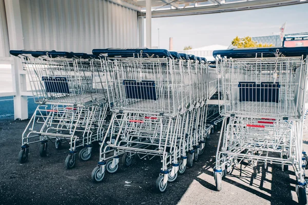 Shopping carts. metal shopping carts at the back of a store, sho — Stock Photo, Image