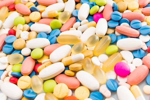 Medicína tablety nebo kapsle. farmaceutický pozadí — Stock fotografie