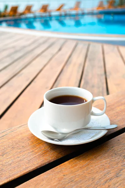 Tea set on plate near spa pool — Stock Photo, Image