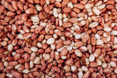 Yiyecek arka planı olarak tuzlanmış fıstığın yakın plan görüntüsü.