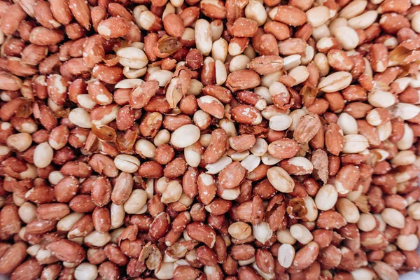 Nahaufnahme von gesalzenen Erdnüssen als Nahrungsmittelhintergrund — Stockfoto