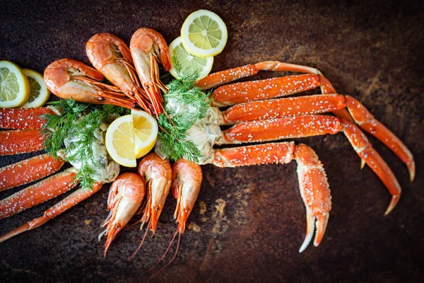 Crab legs on brown rustic background