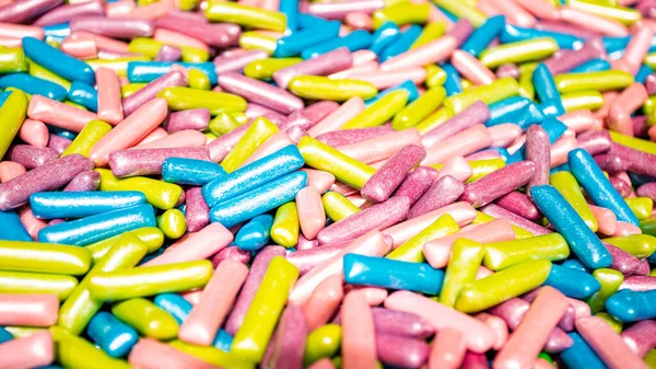 Fechar um fundo de doces coloridos de doces de açúcar — Fotografia de Stock