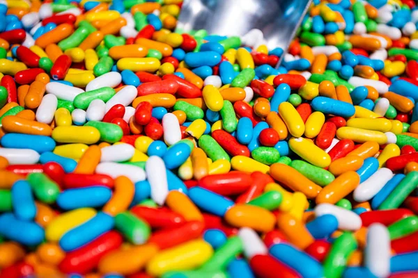 Cerrar un fondo de dulces coloridos de caramelos de azúcar — Foto de Stock