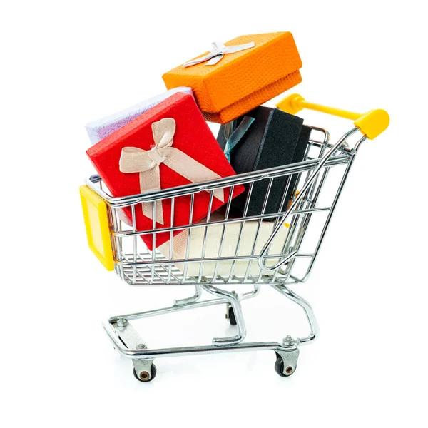 Trolley with gifts on a white background. — Stock Photo, Image