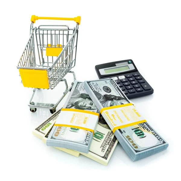 Carrinho de compras, dólares e calculadora. Consept de compras — Fotografia de Stock