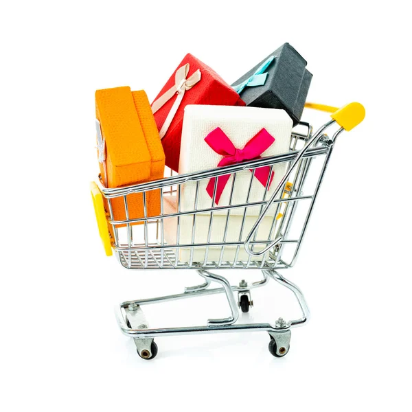 Trolley with gifts on a white background. — Stock Photo, Image