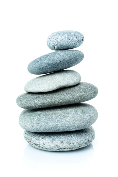 Stacked harmony stones in zen balance. pile of stones isolated o Stock Photo