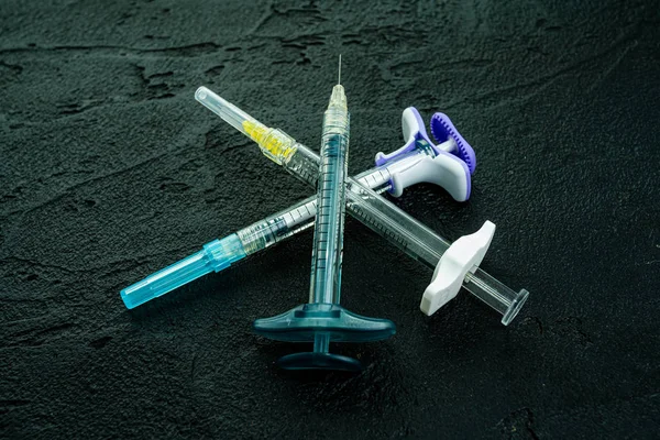 A set of different syringes on lack. Face Cosmetics Injecting — Stock Photo, Image