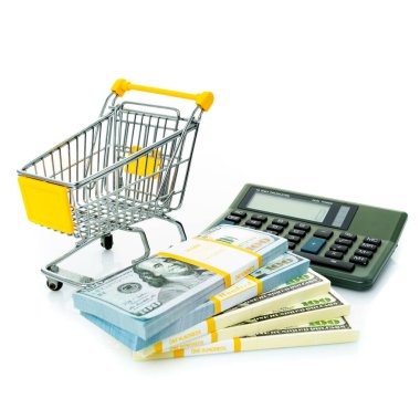 Alışveriş arabası, dolar ve hesap makinesi. Alışveriş kutsaması
