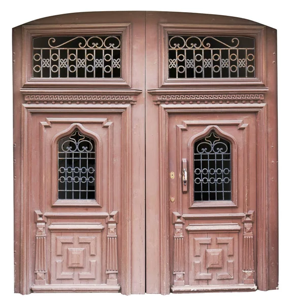 Grande porta in legno vintage marrone con reticoli arrugginiti in metallo . — Foto Stock