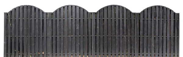 Solid wooden fence of black color.