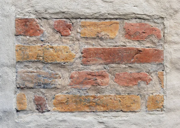 Banner de ladrillos antiguos como elemento de pared enlucida — Foto de Stock