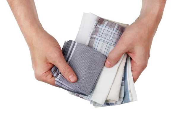 An elderly poor man chooses a clean handkerchief to put in his p — Stock Photo, Image