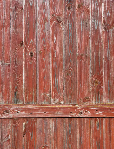 A fragment of a wooden old aged  village fence was once painted — Stock Photo, Image