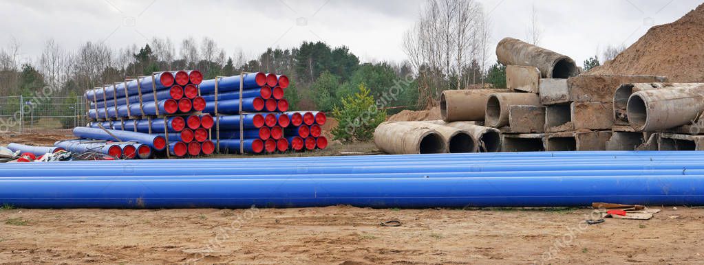 Long blue plastic pipes  for the restoration of the old decayed 