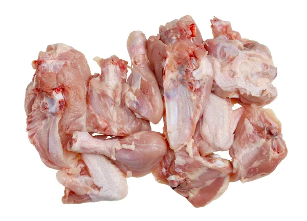 Viele Stücke rohes gehacktes Hühnerfleisch mit Knochen — Stockfoto