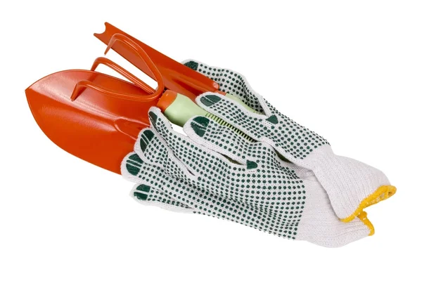 Green gloves and orange mass production garden hand tools — Stock Photo, Image