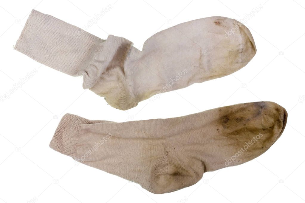 Two old ragged dirty white cotton socks.