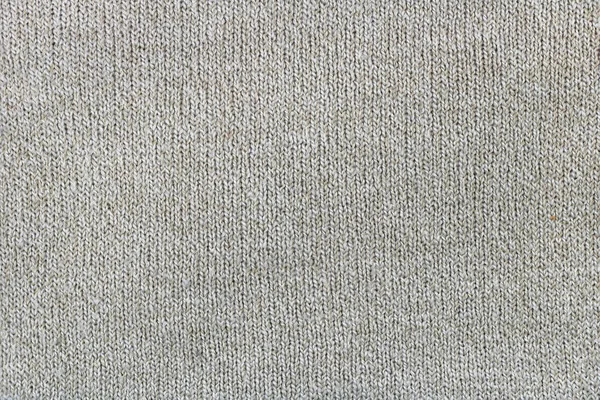 Il maglione fatto a mano è legato con spessi fili di sutura verde — Foto Stock