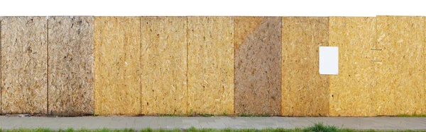 Construction site long yellow fence is made of wooden resin-impr — Stock Photo, Image