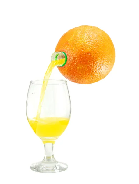 Orange juice pouring into a glass — Stock Photo, Image