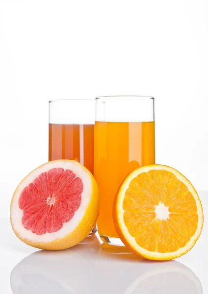 Glasses of healthy grapefruit  and orange juice — Stock Photo, Image