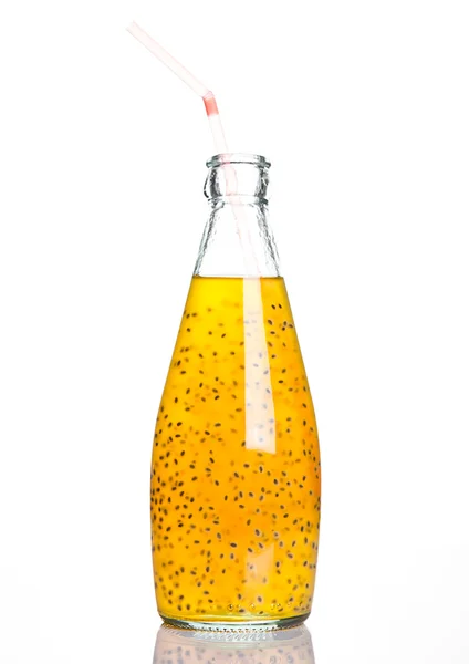 Garrafa de suco saudável exótico com sementes de frutas — Fotografia de Stock