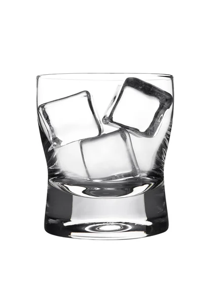 Empty glasss of whiskey with ice cubes isolated — Stockfoto