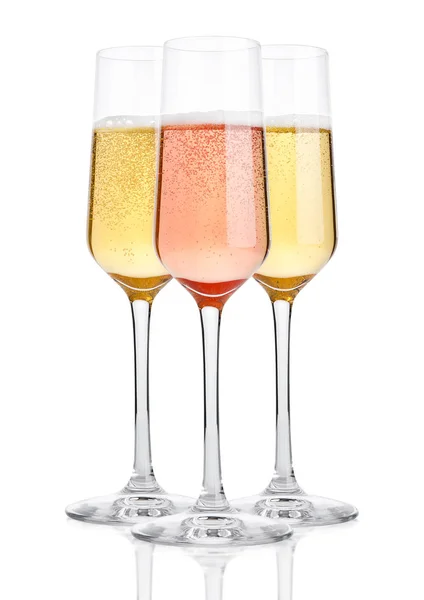 Glasses of champagne with bubbles on white — Stock Photo, Image