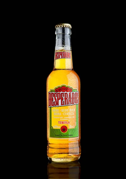 LONDON, UK - DECEMBER 15, 2016: Bottle of Desperados beer, lager flavored with tequila is a popular beer produced by Heineken and sold in over 50 countries. — Stock Photo, Image