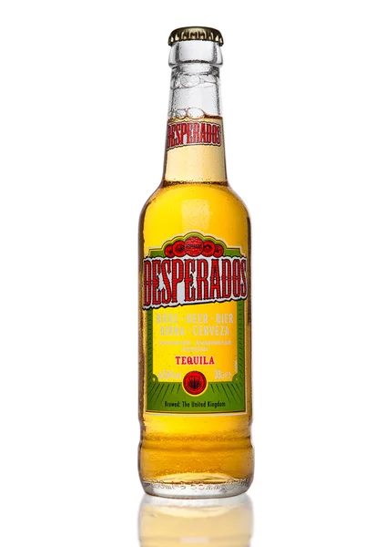 LONDON, UK - JANUARY 02, 2017: Bottle of Desperados beer on black background, lager flavored with tequila is a popular beer produced by Heineken and sold in over 50 countries. — Stock Photo, Image