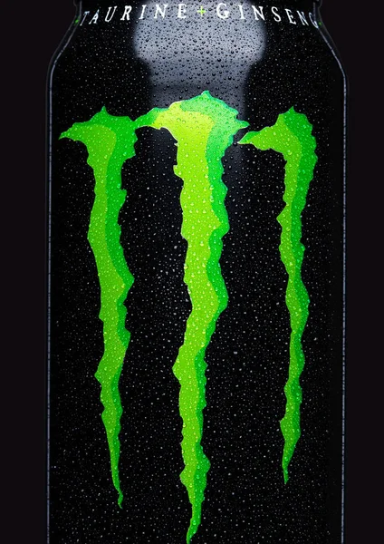 LONDON, UK - MARCH 15, 2017:  A can of Monster Energy Drink on black. Introduced in 2002 Monster now has over 30 different drinks with high a caffeine content. — Stock Photo, Image