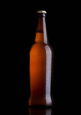 Kahverengi cam bira şişesi siyah sarı kapaklı
