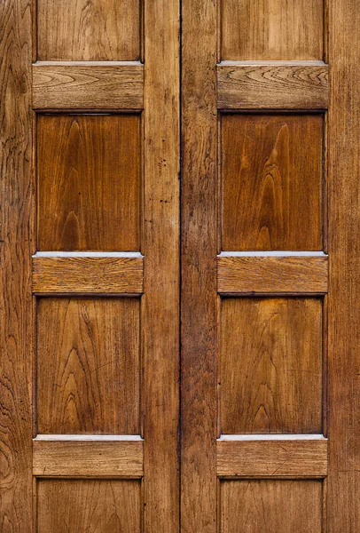 ประตูไม้เก่าที่มีเนื้อเยื่อแผ่นสี่เหลี่ยม — ภาพถ่ายสต็อก