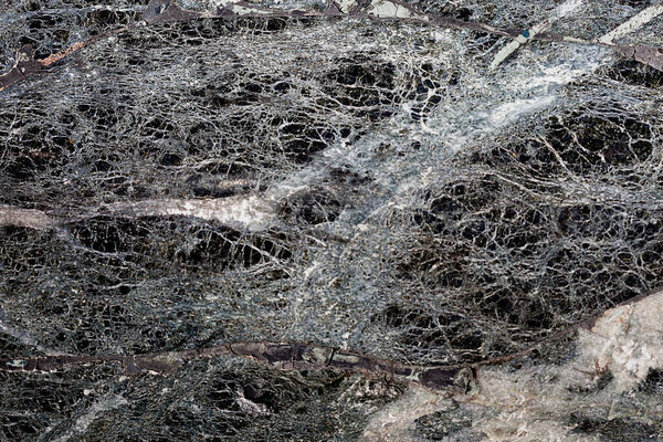 Black marble tile texture background with cracks