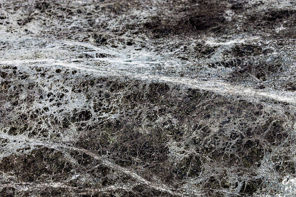 Black marble tile texture background with cracks