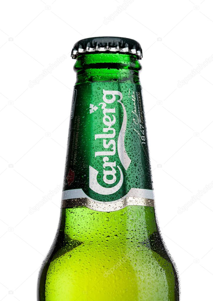 LONDON, UK - MAY 29, 2017: Bottle Of Carlsberg beer on white background. Danish brewing company founded in 1847.