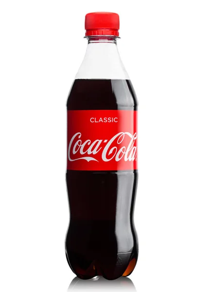 LONDON, UK - JUNE 9, 2017: Bottle of Coca cola soft drink on whi — Stock Photo, Image