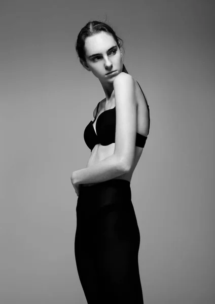 Beautiful fashion girl wearing black fancy lingerie — Stock Photo, Image