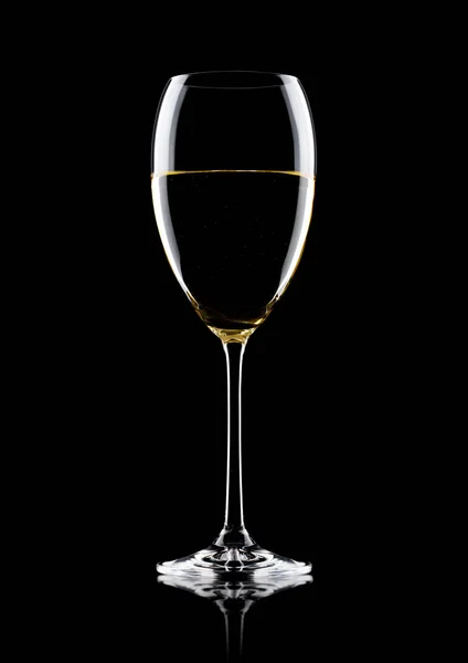 Glass of white wine with reflection on black — Stock Photo, Image